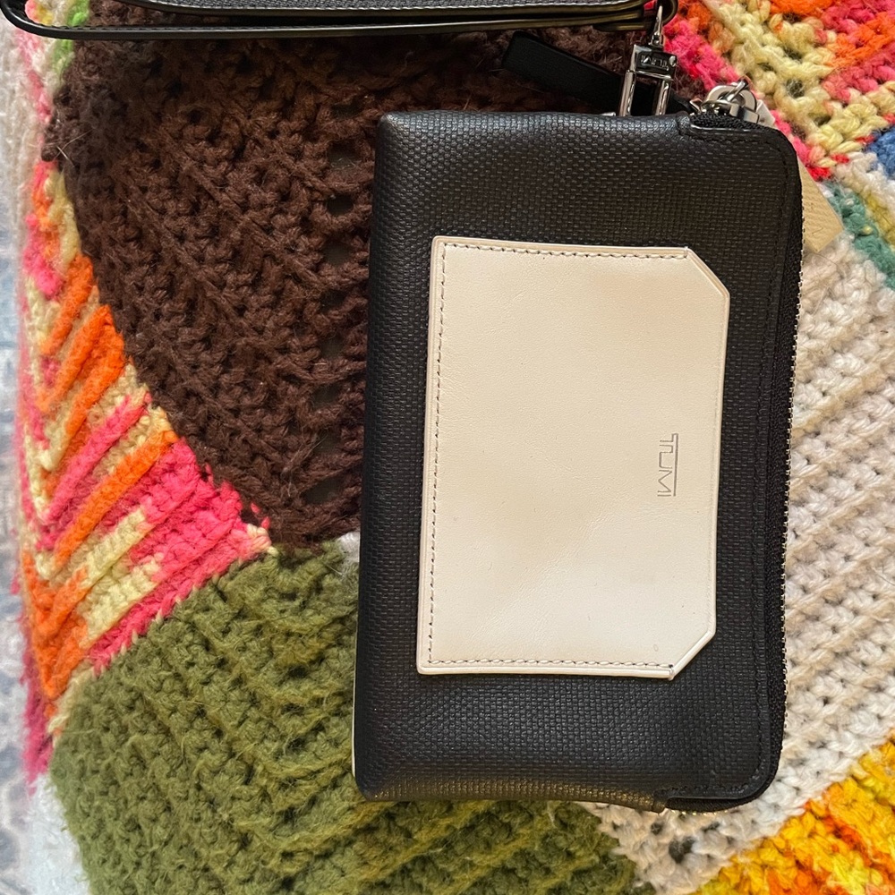 Tumi leather black and white wallet